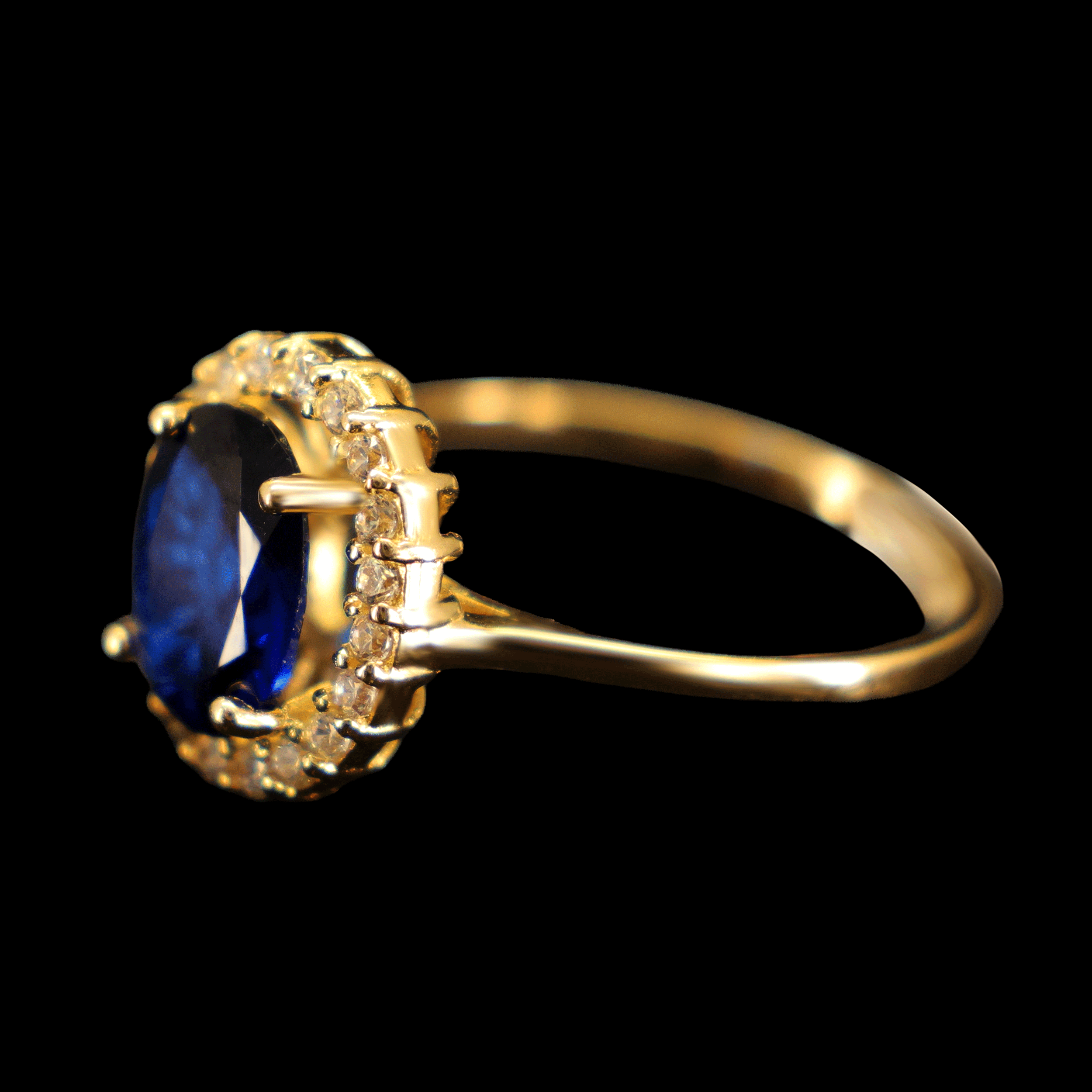 ANILLO ZN OVALADA AZUL BISEL EN BLANCO 10K
