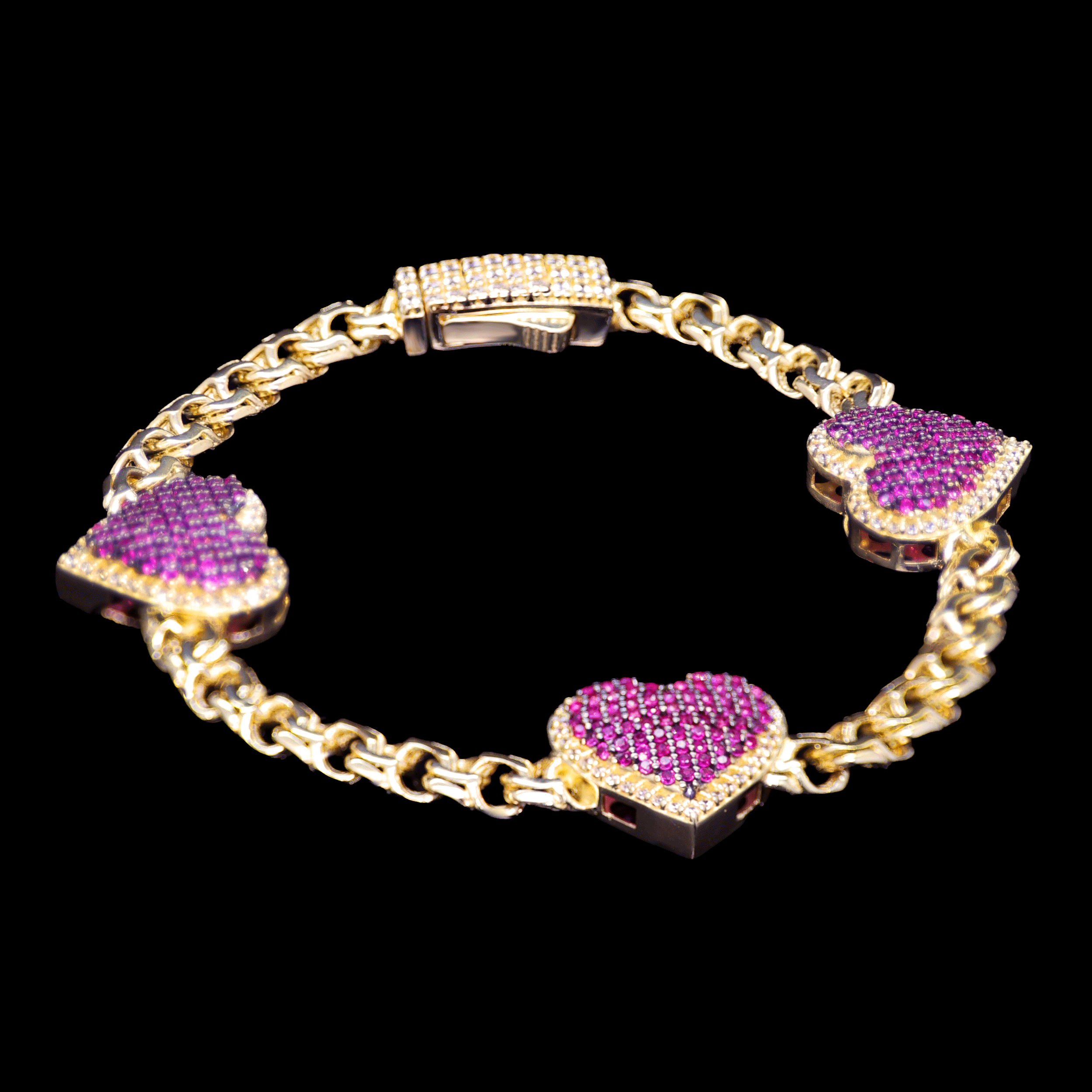 PULSO TRES CORAZONES FUCSIA 10K