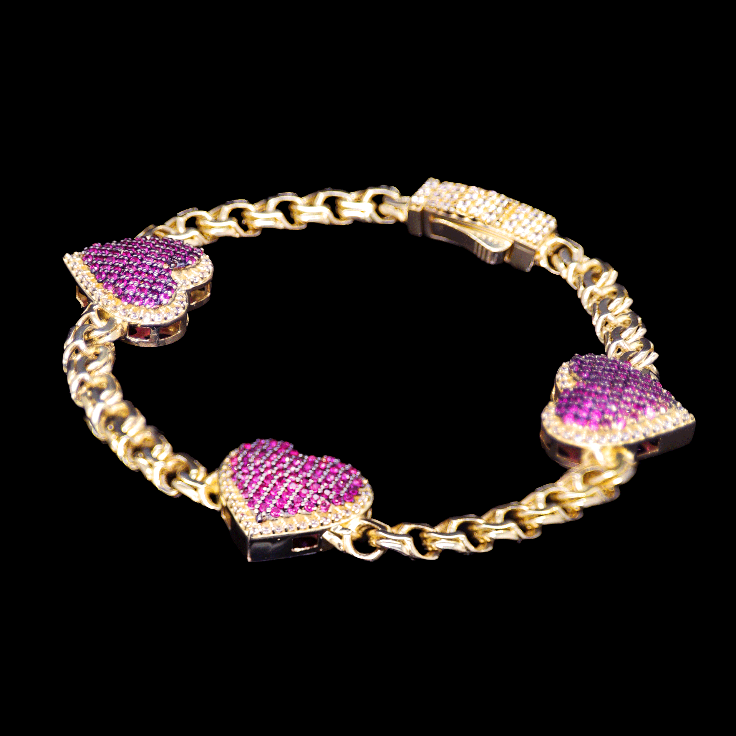 PULSO TRES CORAZONES FUCSIA 10K