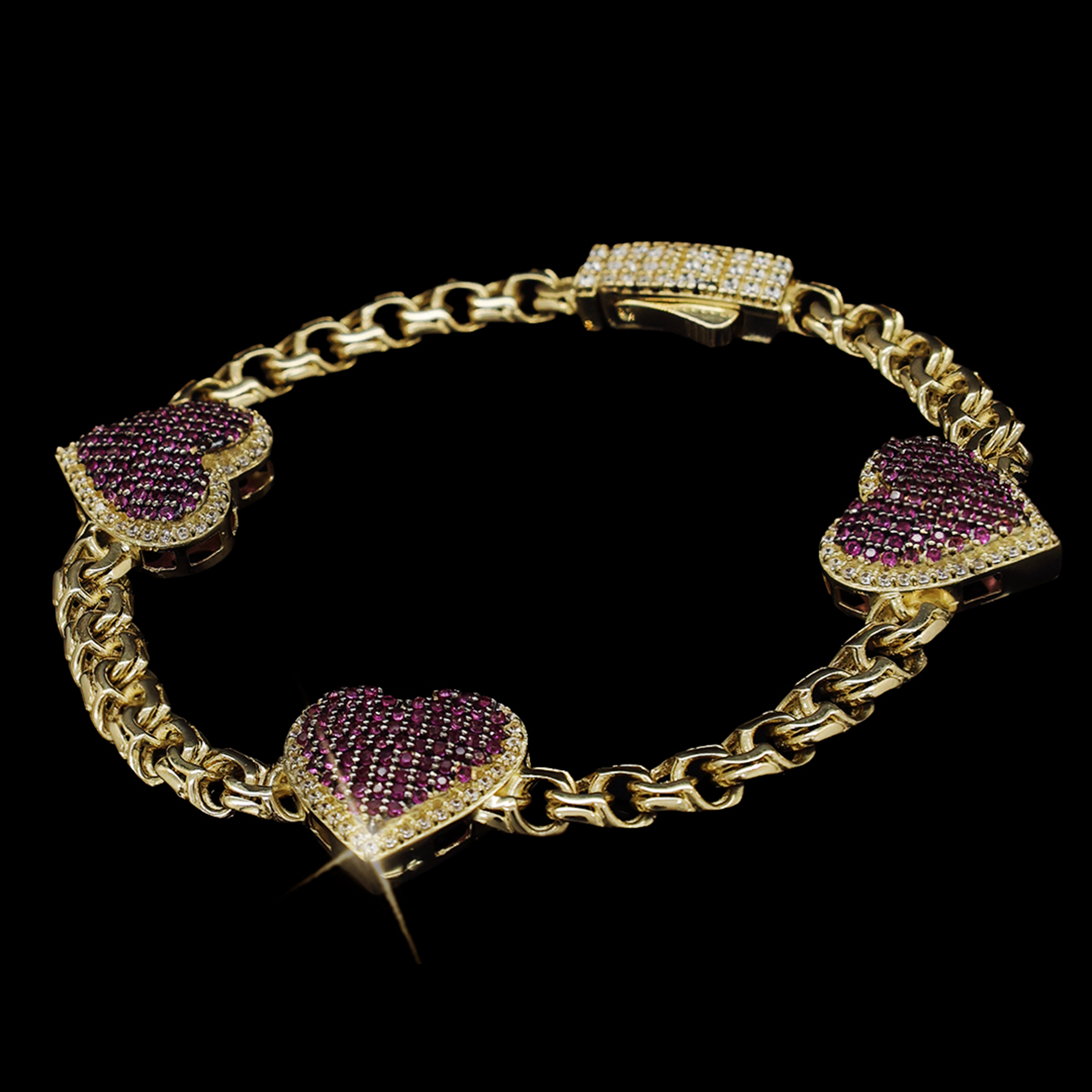 PULSO TRES CORAZONES FUCSIA 10K