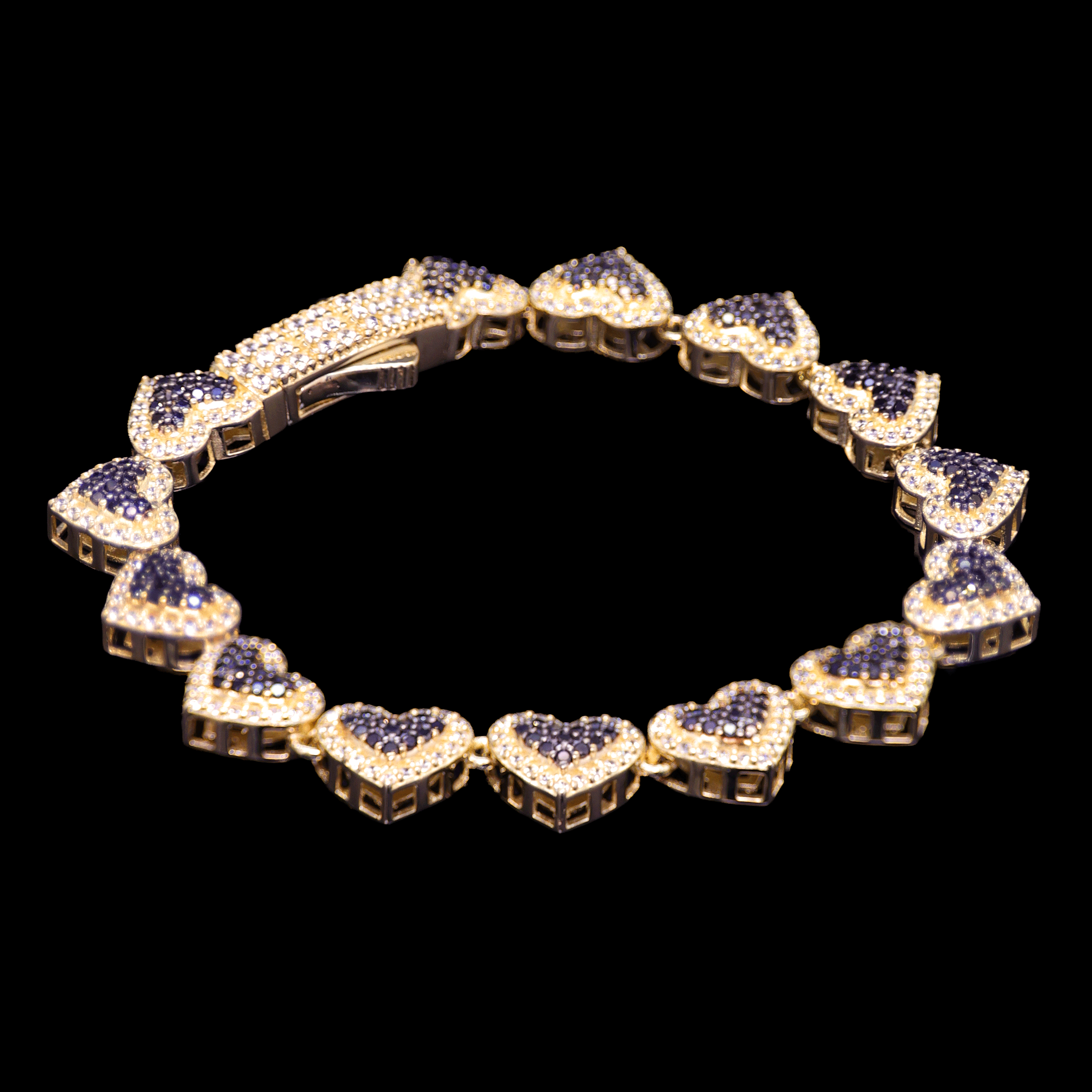 PULSO CORAZONAS C/ZN NEGRA BISEL BLANCO 10K