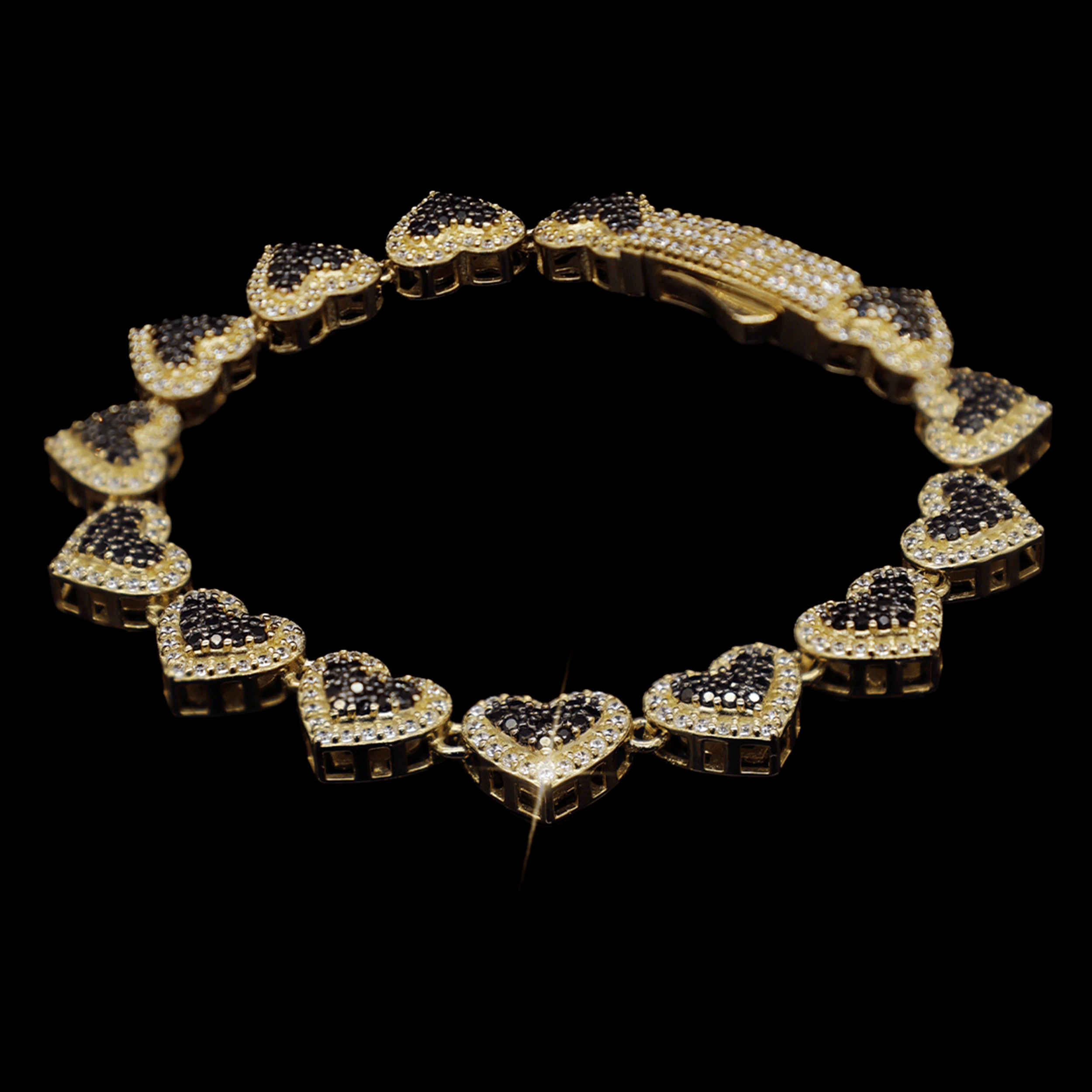 PULSO CORAZONAS C/ZN NEGRA BISEL BLANCO 10K