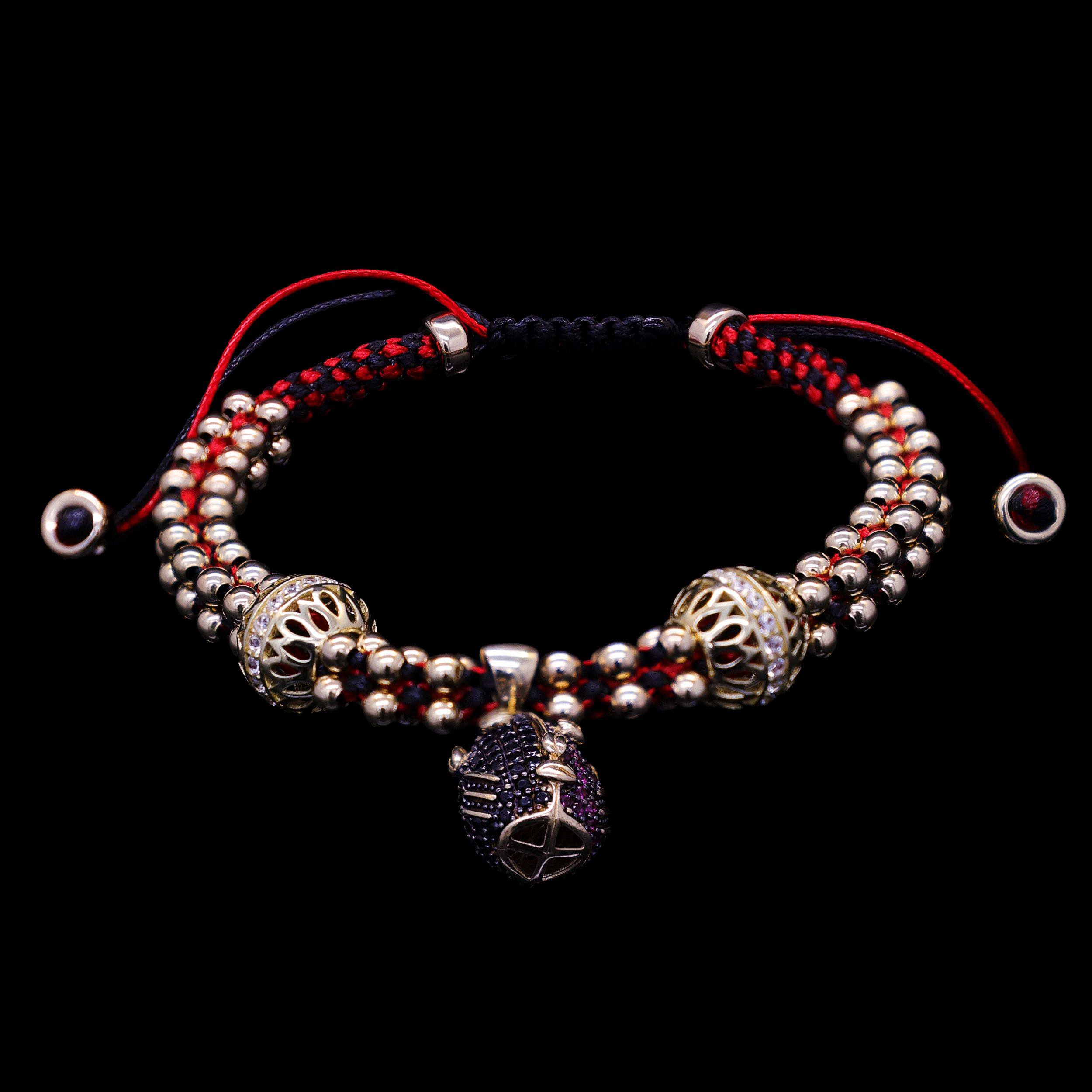 PULCERA TEJIDA ROJO /NEGRO DIJE ELEGGUA 10K